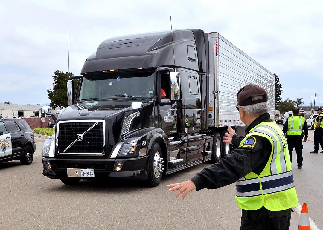 A big rig being pulled over by inspectors during a surprise inspection in Santa Monica, California.