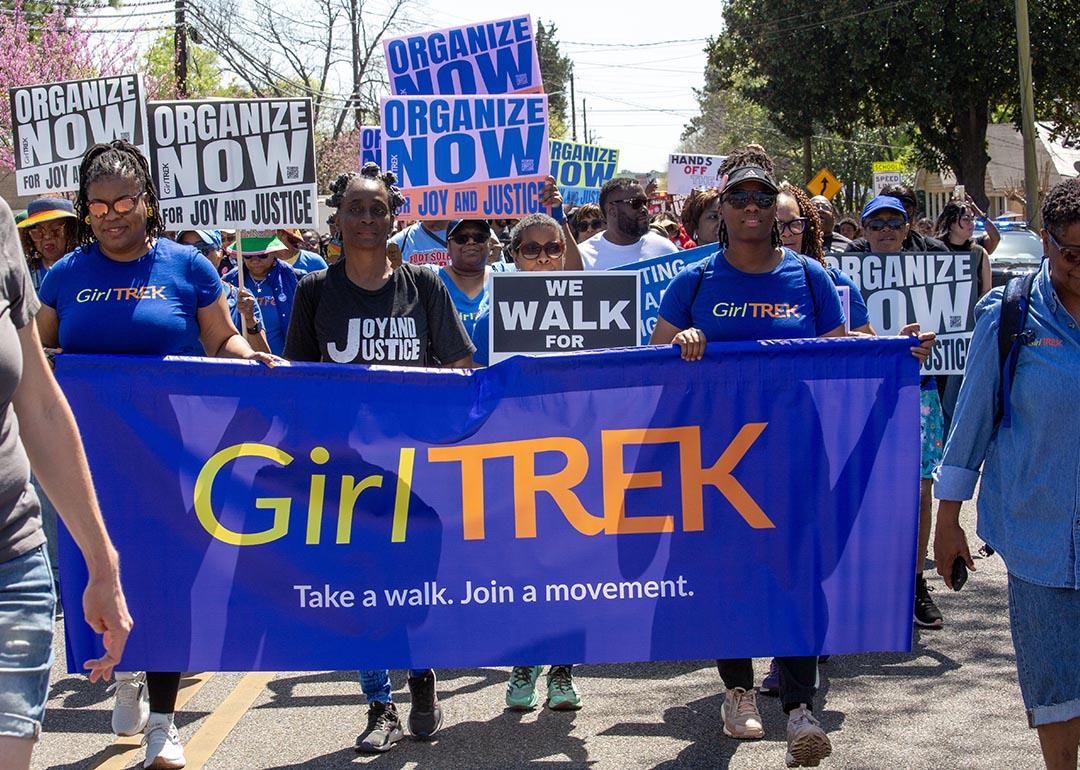 GirlTREK participates in a walk to the Alabama state capitol as part of the 60th anniversary celebration of the historic 1965 Selma to Montgomery.