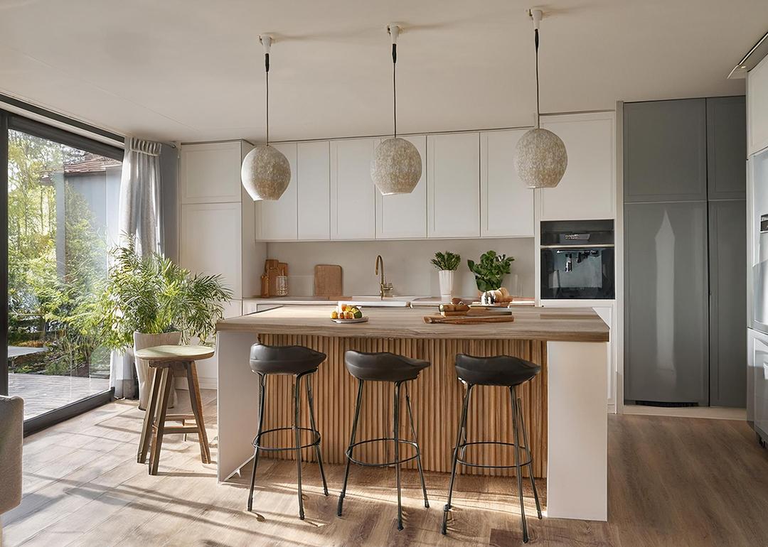 A stylish modern interior of a home kitchen.