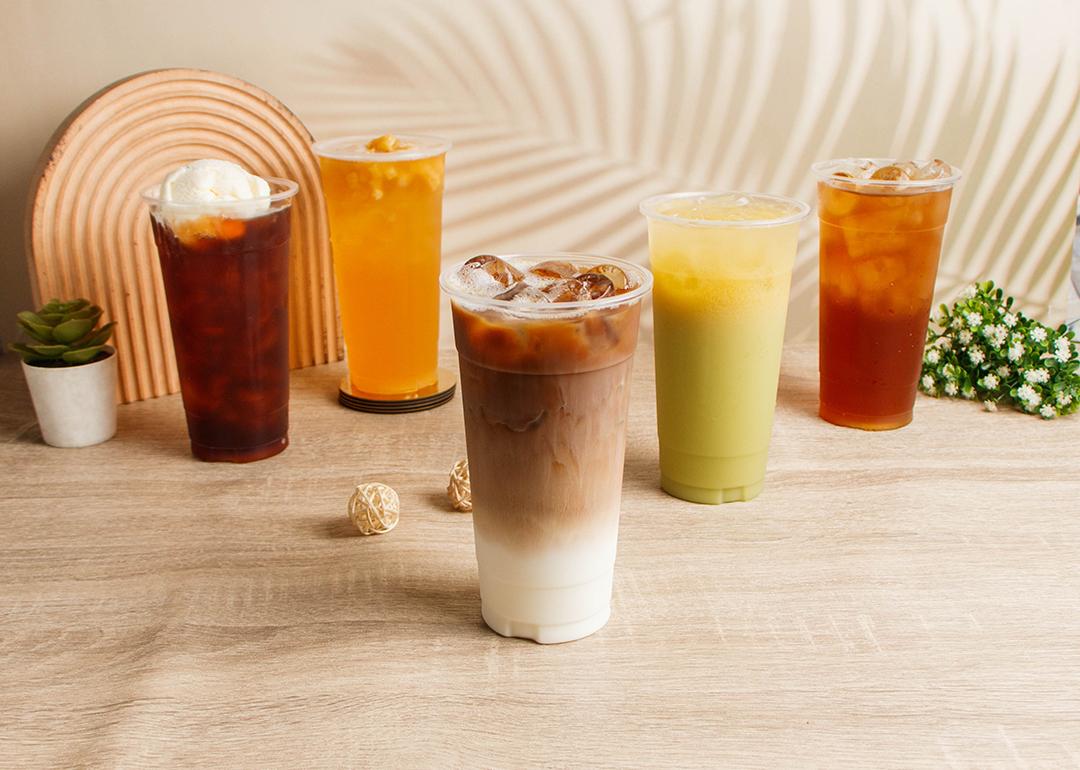 Assorted summer drinks such as coffee, milk tea, and fruit juice drinks.