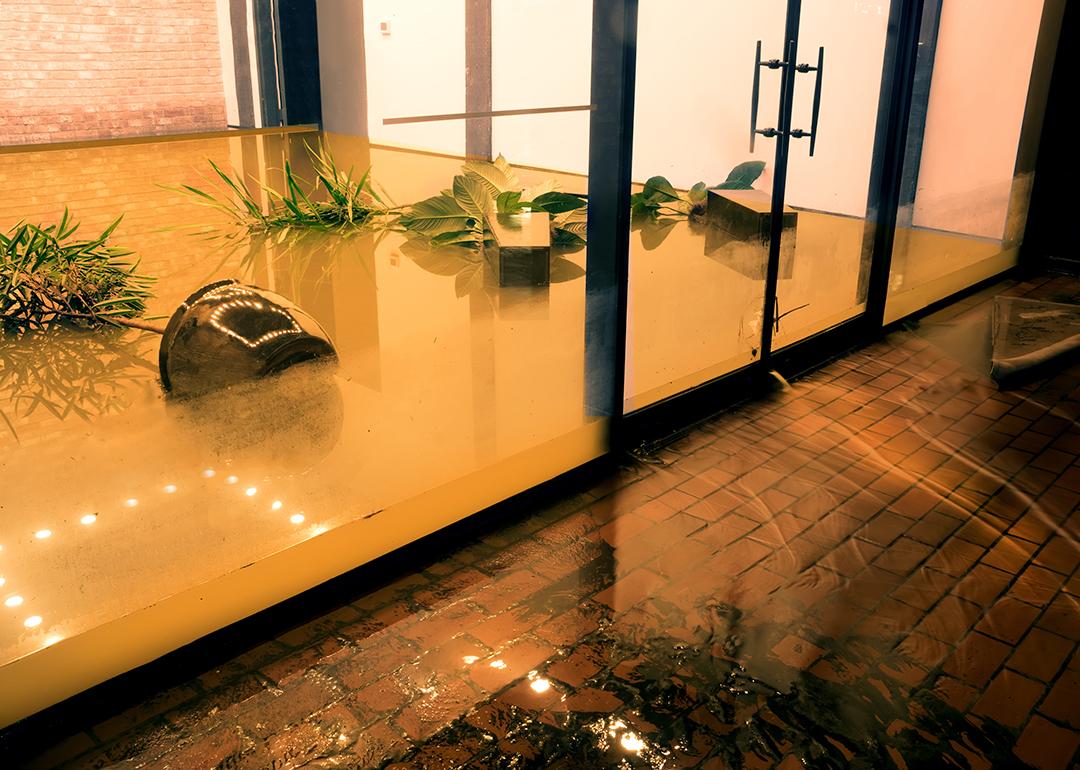 Water flowing from a flooded office during the tropical depression, Imelda, in Houston, Texas.