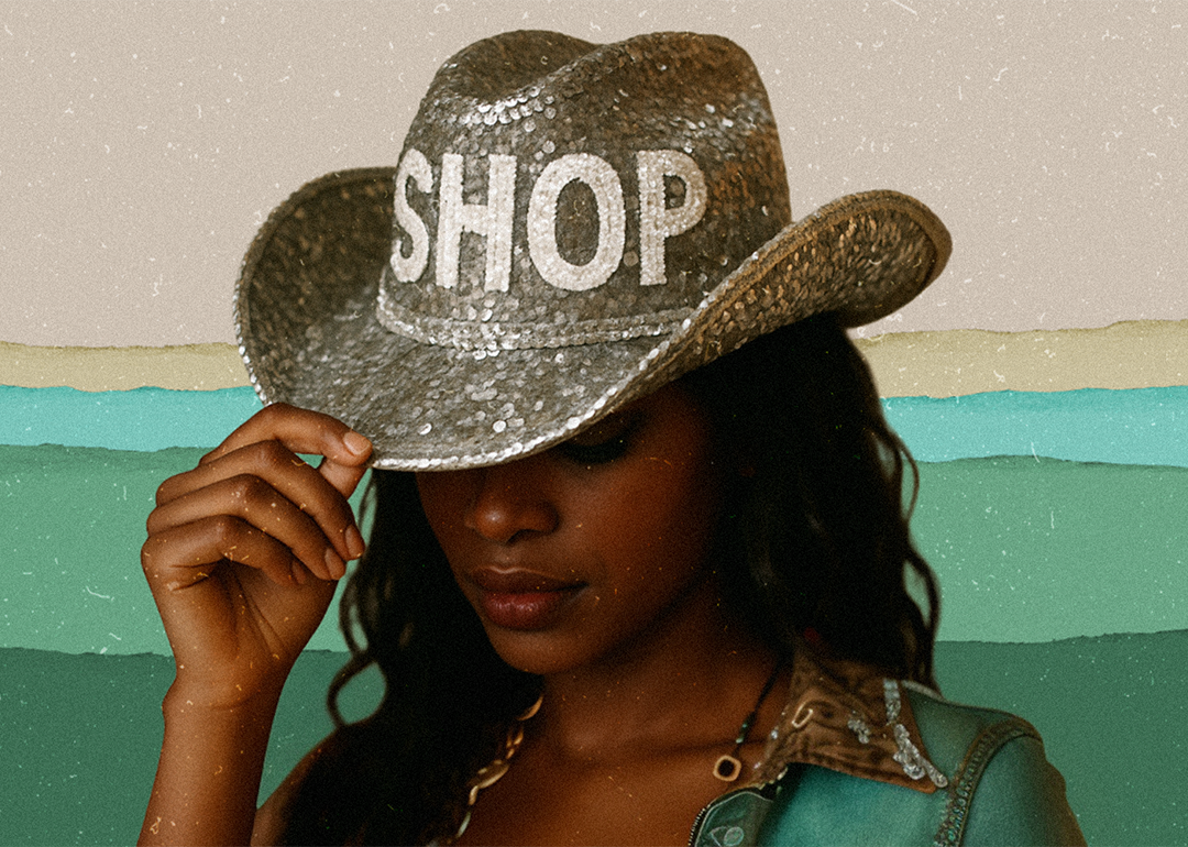 A person styled to look like Béyonce tips a silver bejeweled cowboy hat with the word "SHOP" on the front, against a gradient background of green.