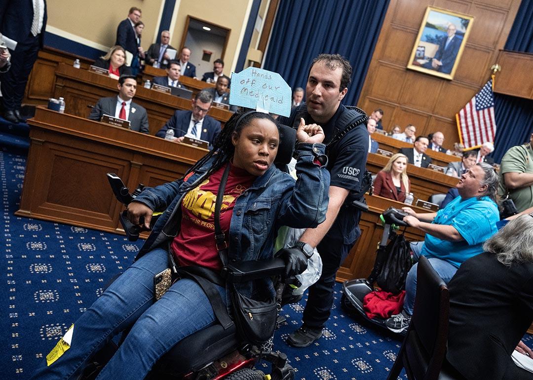 Demonstrators calling for preservation of Medicaid funding, are removed from the House Energy and Commerce markup of the FY2025 budget resolution.