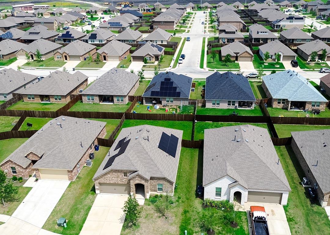 New construction home with solar panel roofs in rapid growing Princeton, Collin County, North Texas.