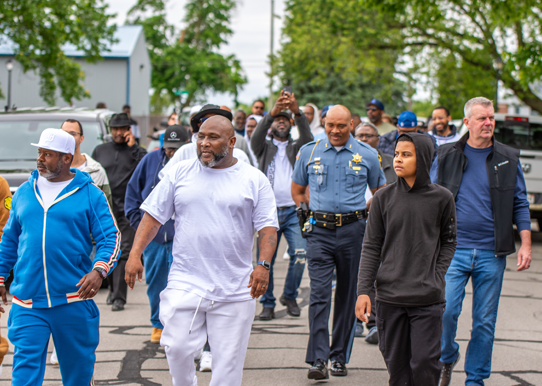  Roderick Parker, in white, Director of Big Hearts Community Projects at the 1,000 person march against gun violence in Fort Wayne, Indiana, on May 25th, 2025.