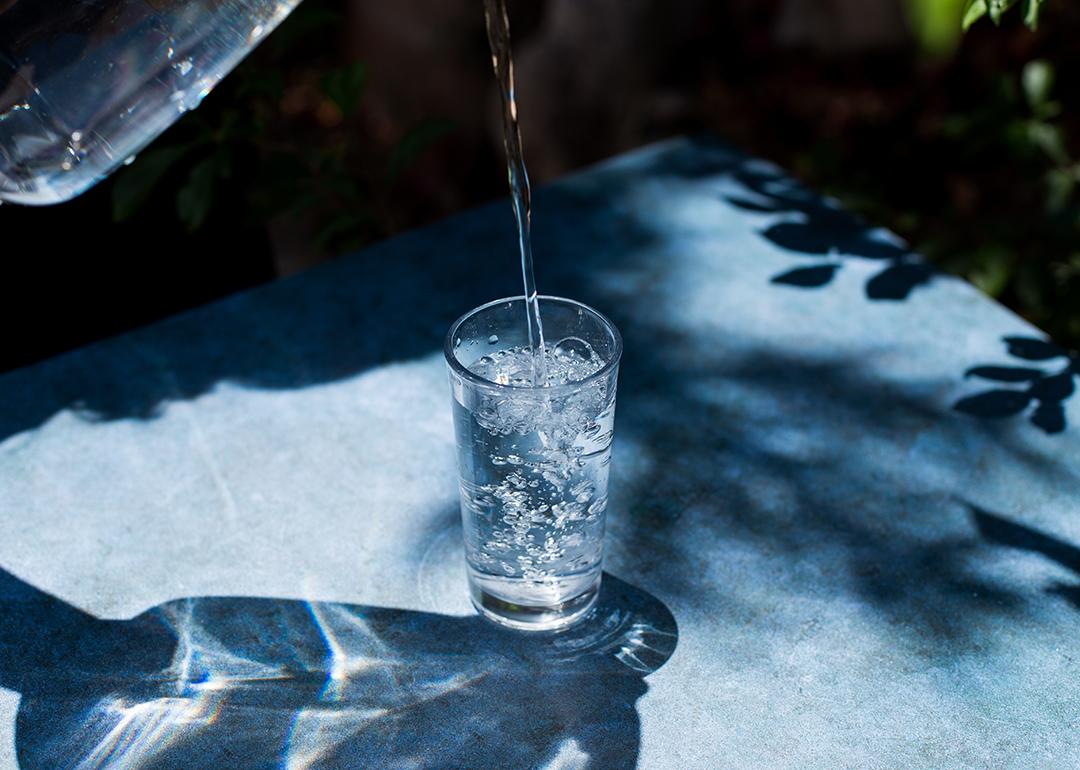 Water being poured onto a glass.