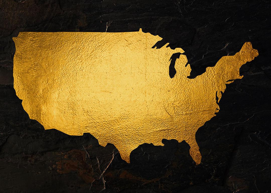A map of the United States rendered in gold foil.