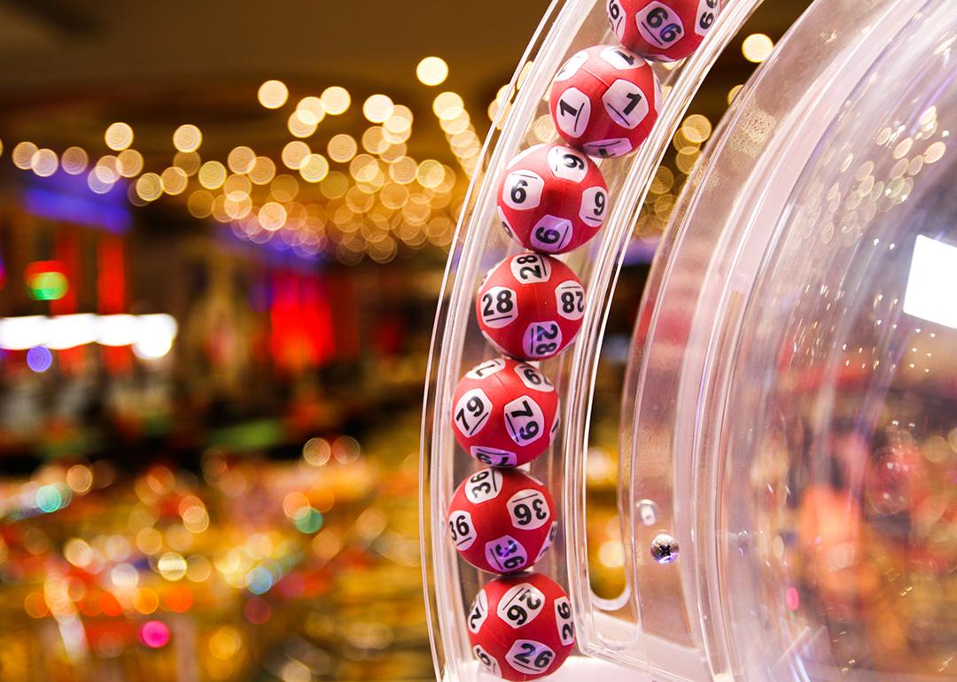 Red lottery balls in a bingo machine in a casino.