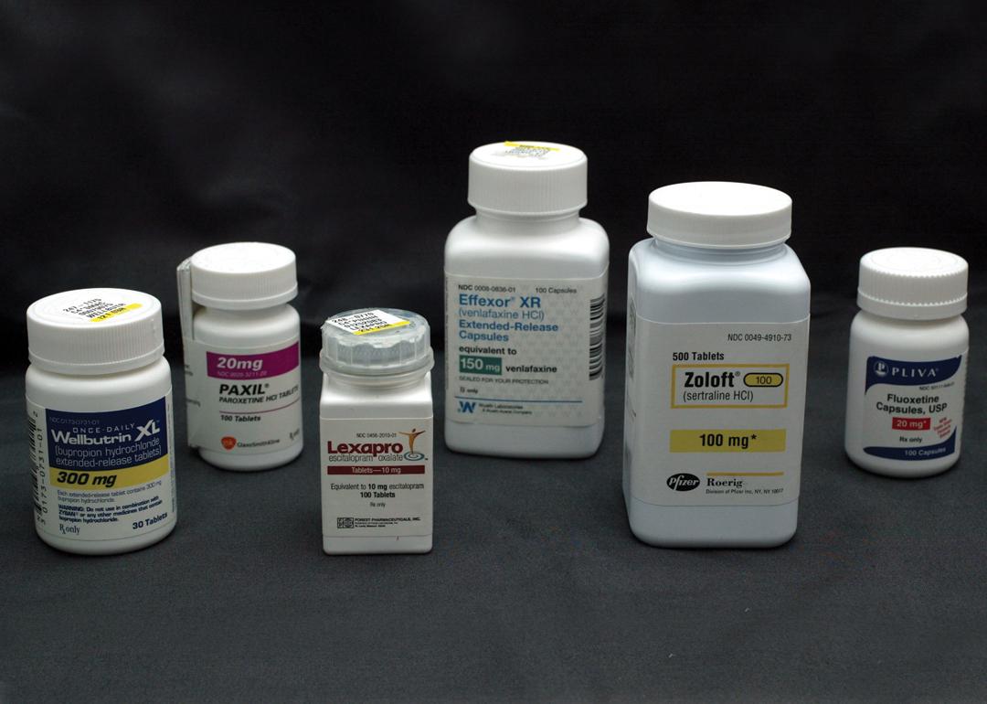 Bottles of antidepressant pills. From left to right: Wellbutrin, Paxil, Lexapro, Effexor, Zoloft, and Fluoxetine.