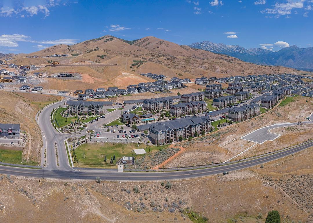 Aerial view of homes by the mountains in Lehi, Utah.