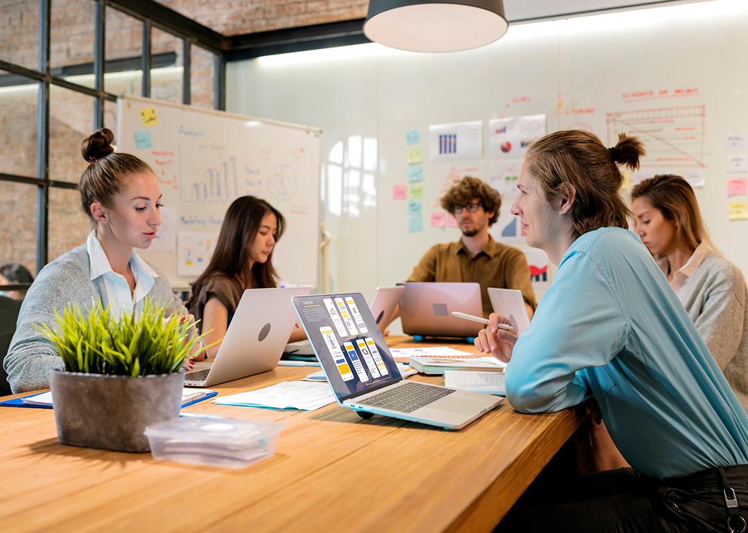A creative team brainstorming during a meeting.