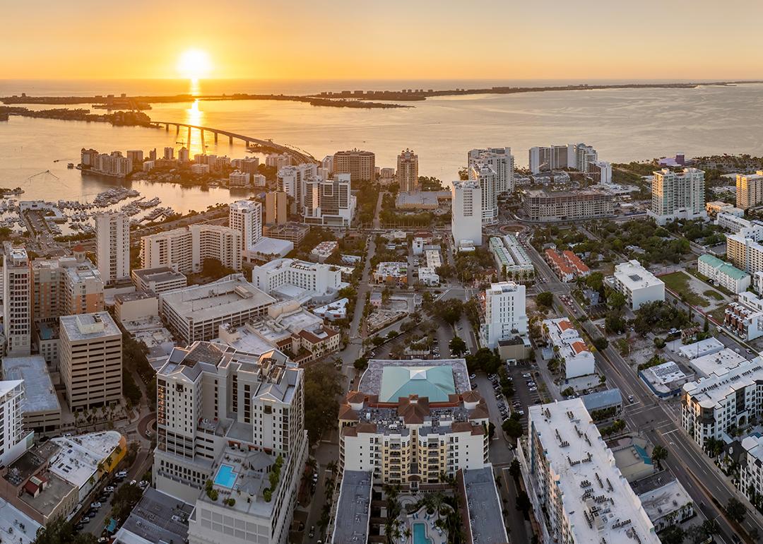 Aerial view of a downtown real estate development in Sarasota City in Florida during sunset.
