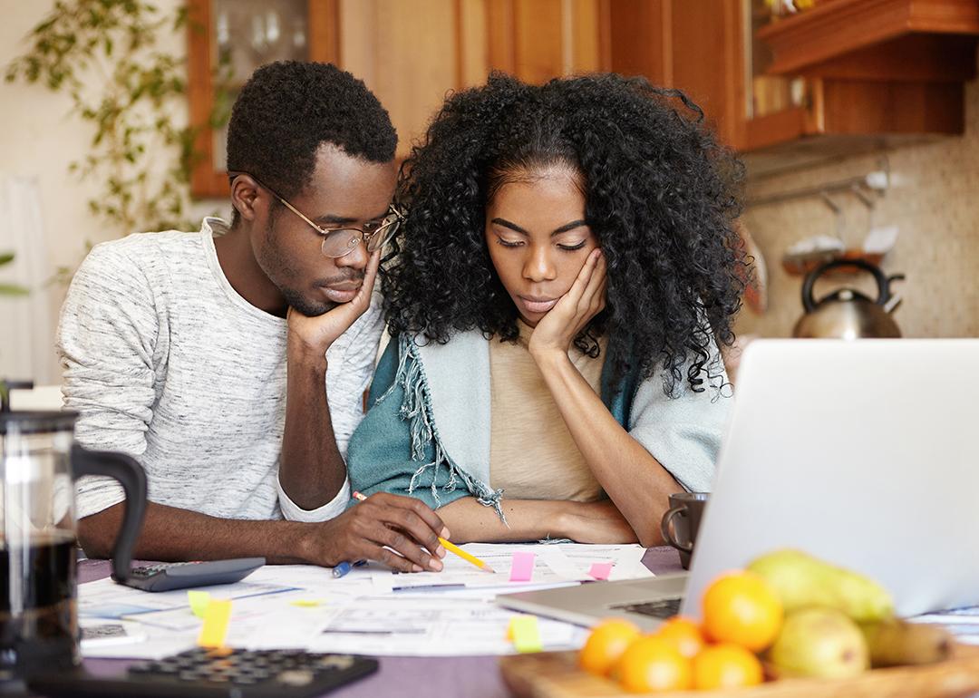 A couple reviews their finances.