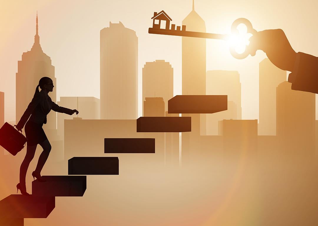 Illustration of a businesswoman walking up stairs to reach a figure of a house key.