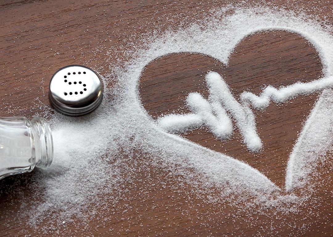 A heart rate line shaped on spilled salt.