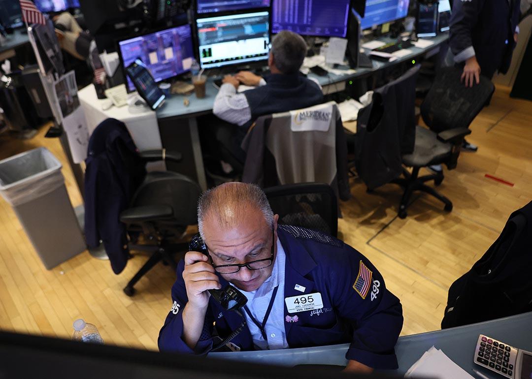 Traders work on the floor of the New York Stock Exchange during morning trading on September 17, 2025 in New York City when stocks were on the rise during the market open in anticipation of an interest rate cut.