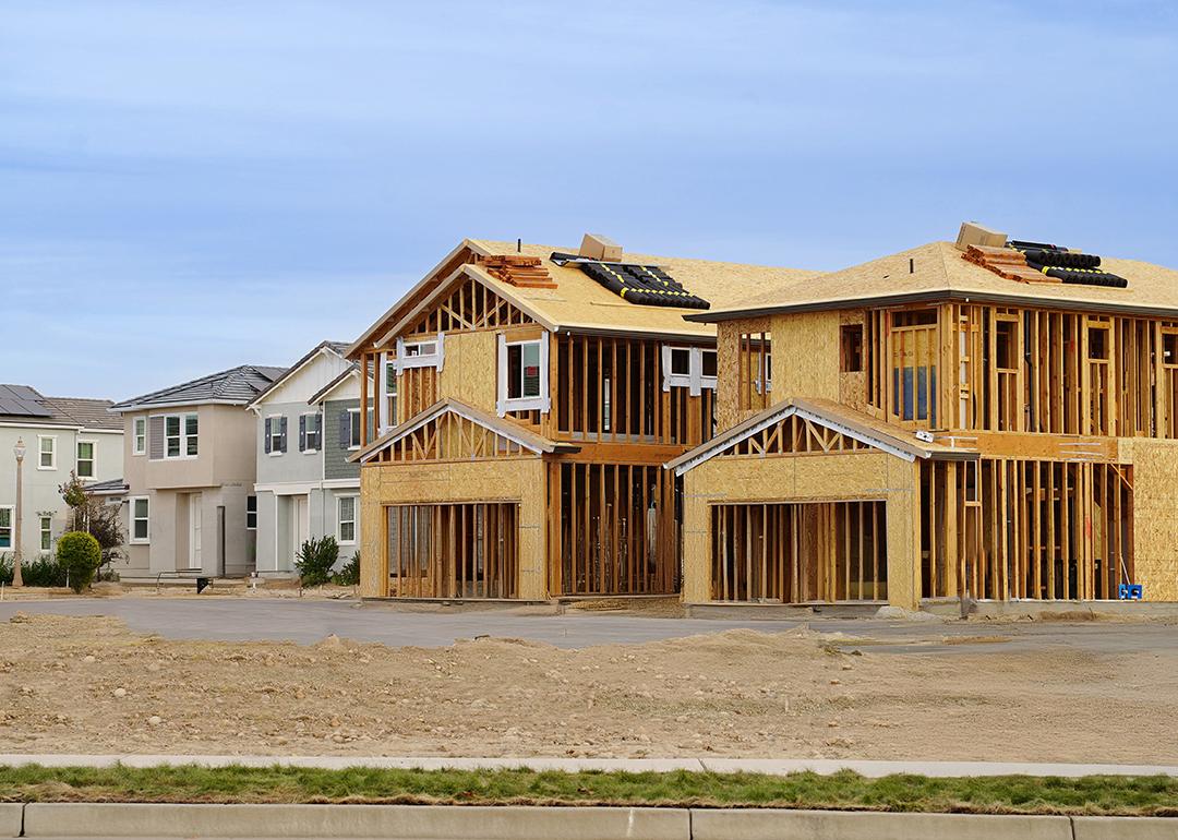 A row of finished homes and a few still under construction.