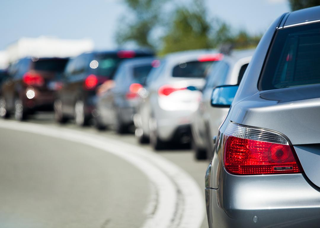 One side of the road with bumper-to-bumper traffic.