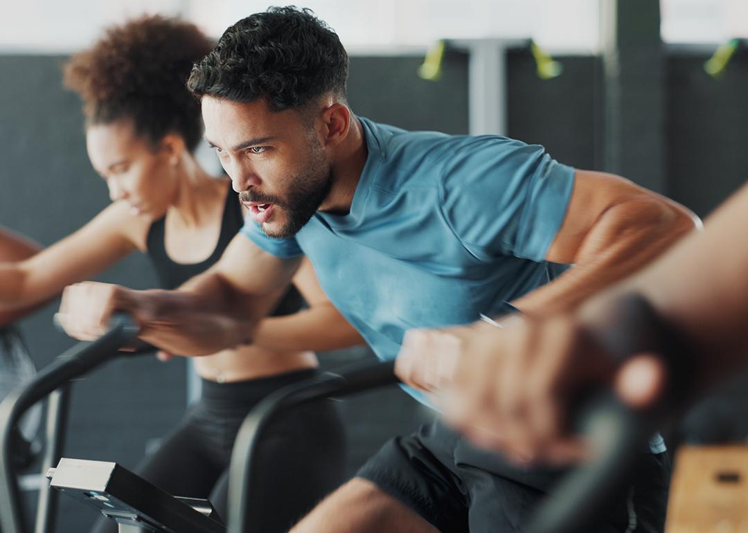 People during a fitness bike gym session.