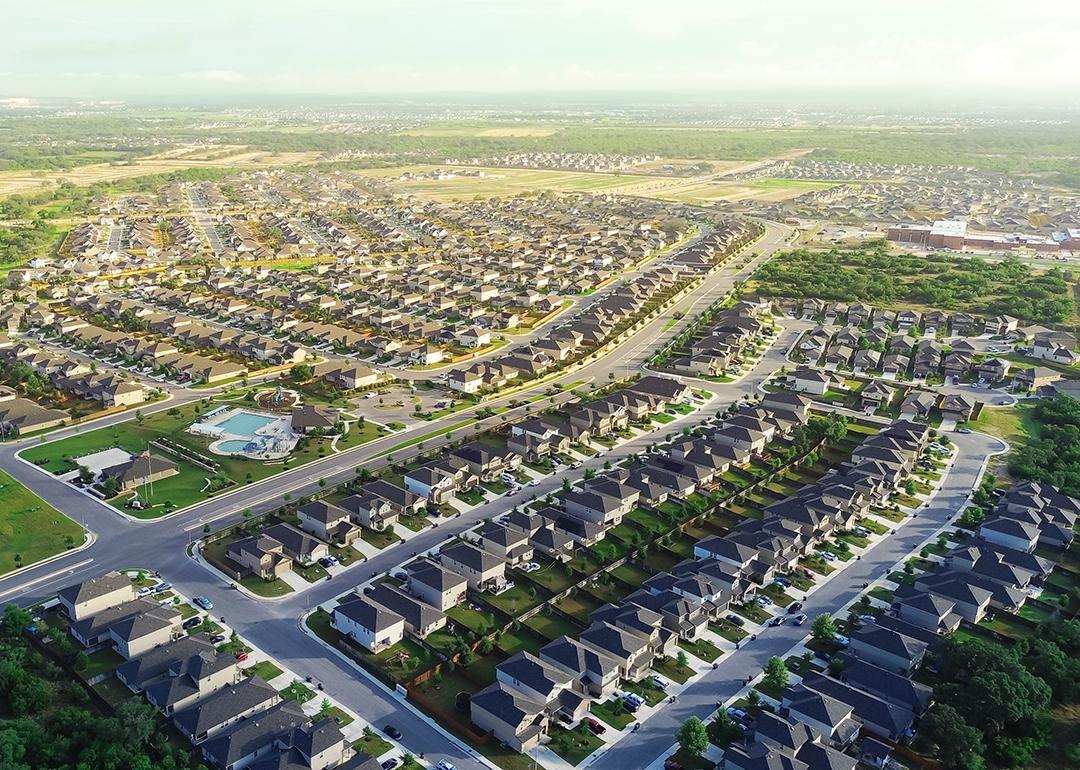 Aerial view of a masterplanned community of two-story houses in San Antonio, Texas.