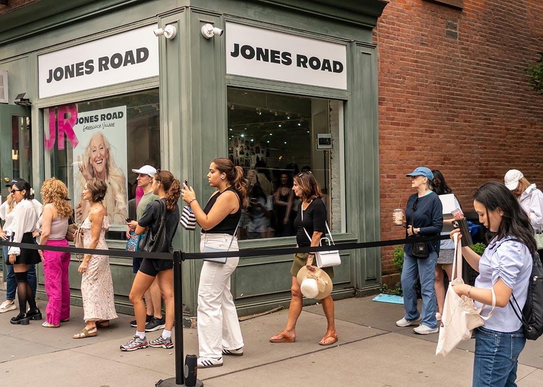 Customers waiting to go in at the grand opening of the Jones Road brand cosmetics store in Greenwich Village in New York.