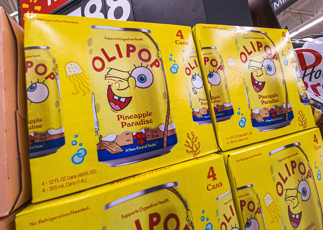 Boxes of OLIPOP's collaboration probiotic drink with Spongebob Squarepants 'Pineapple Paradise' on display on a grocery store.