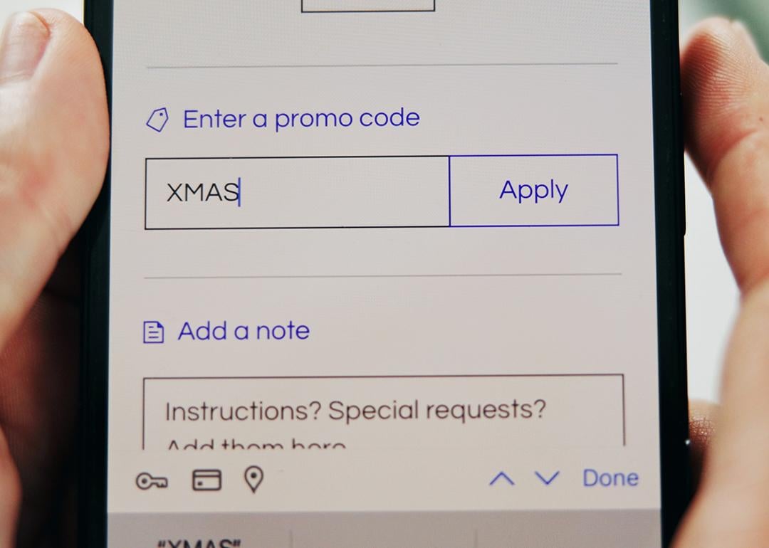 A Christmas promo code added into a shopping app checkout page.