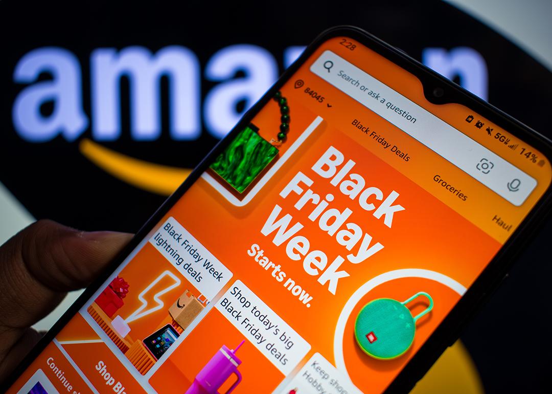 The 'Black Friday Week' banner on the Amazon app displayed on a smartphone.