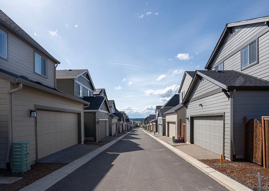 The driveway shared by single-family houses on smaller lots in a large suburban community.