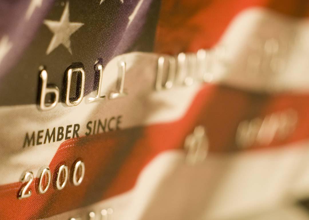 A close up of a credit card designed with the US flag.