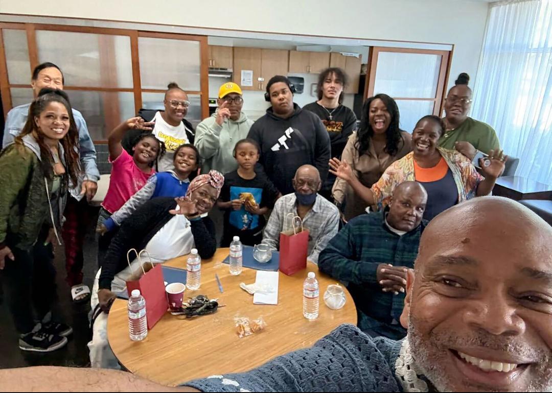  Dexter Hall, right, takes a self-portrait with formerly unhoused elders working with youth navigating homelessness.