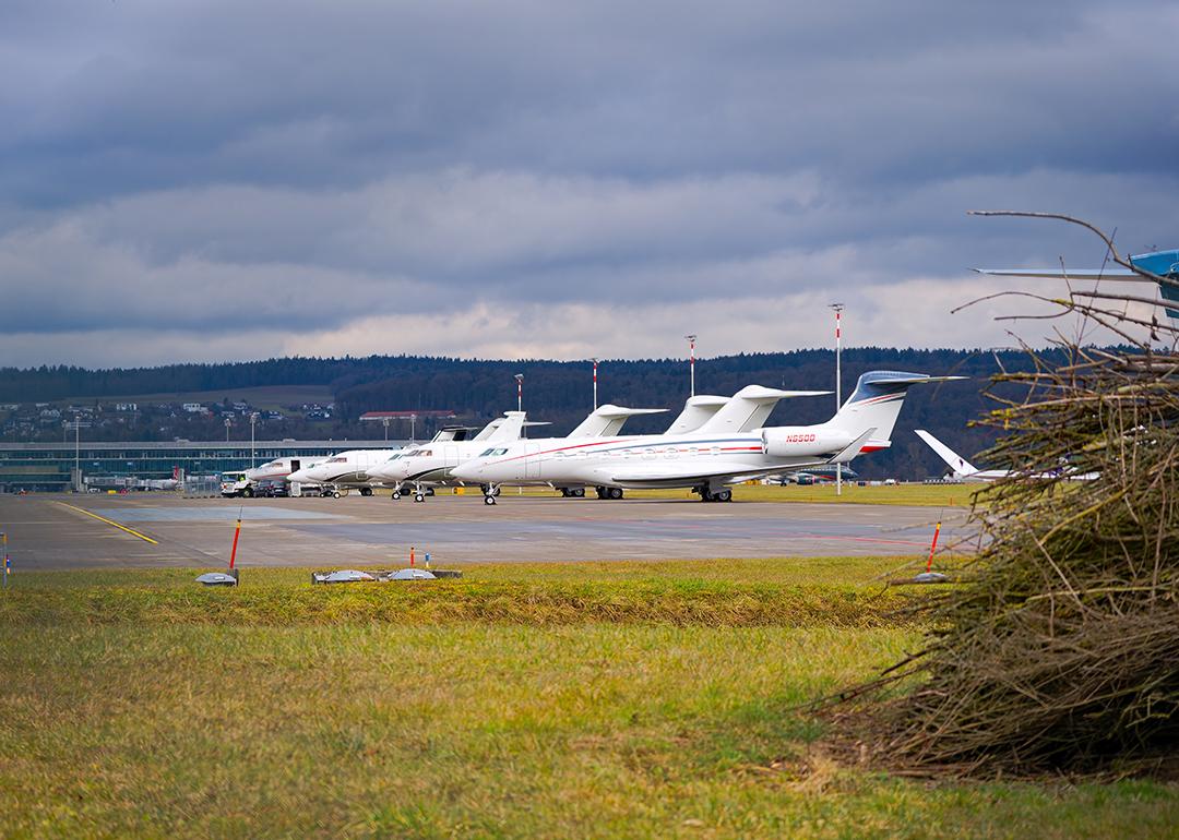 Private jets parked at a Swiss airport.