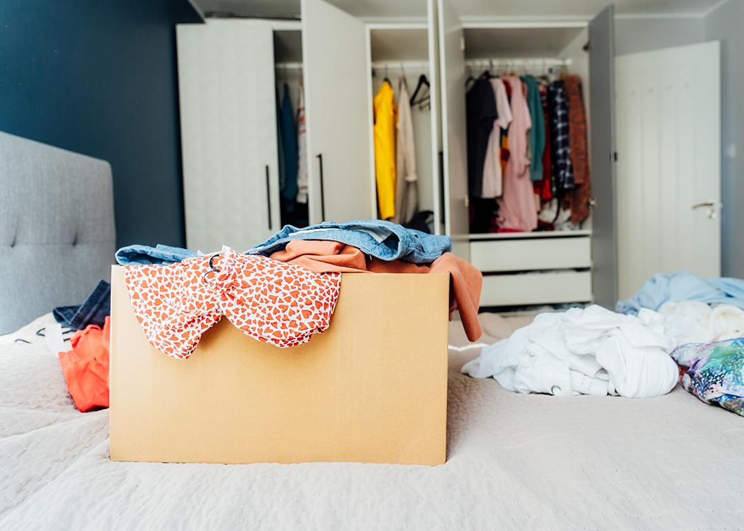 A box full of selected clothes from closet cleanup.
