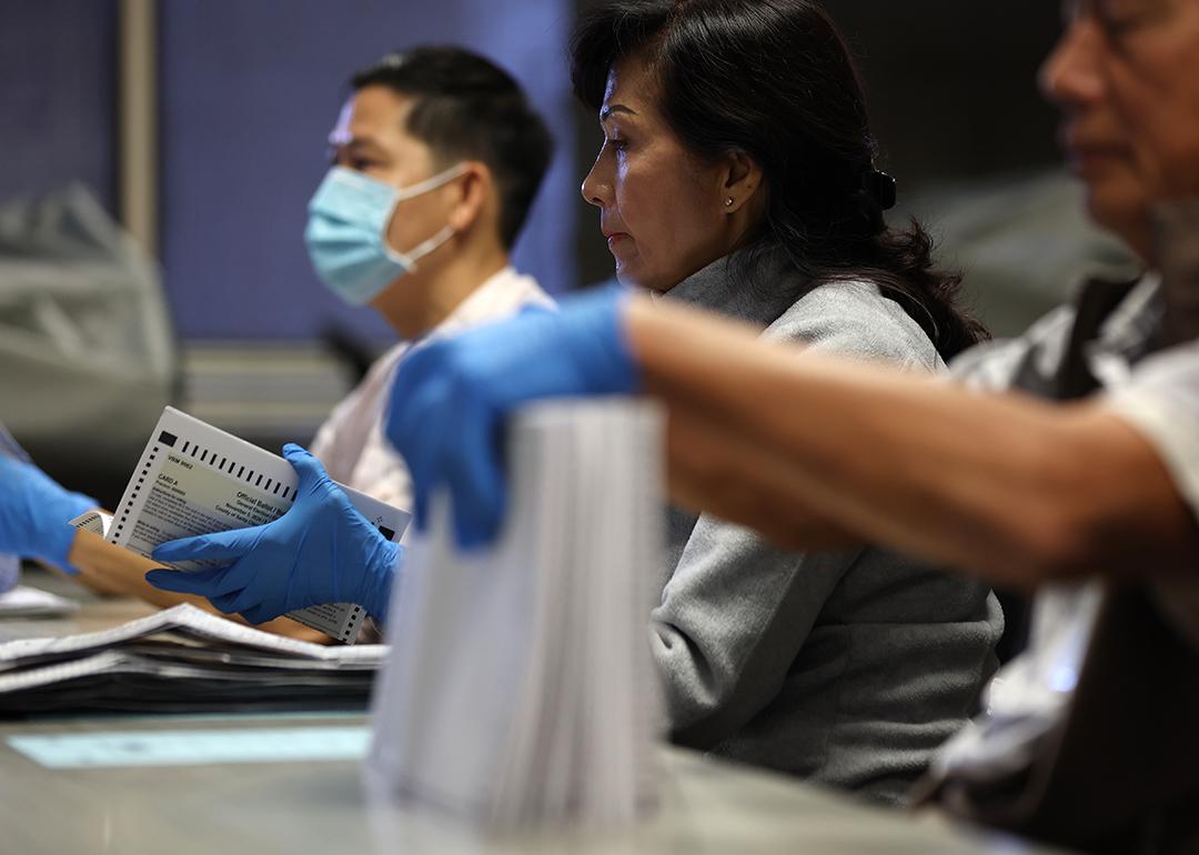 Election workers sorting mail-in ballots at the Santa Clara County registrar of voters office on October 21, 2024 in San Jose, California.