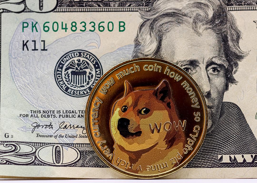 Crypto Dogecoin in front of a $20 US banknote.