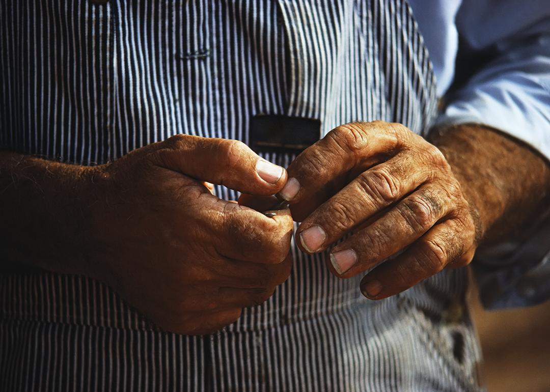Close up of a farmer's hands.