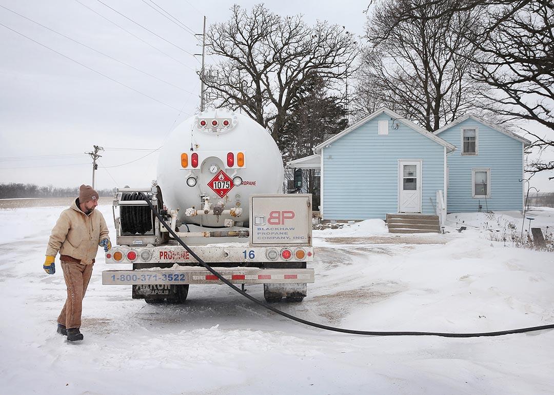 Mark Burger of Blackhawk Propane delivers propane to a rural home on January 24, 2014 near Clinton, Wisconsin.