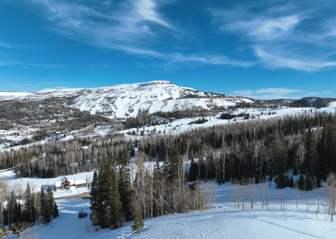 An aerial view of Brian Head ski resort in winter on a clear day.