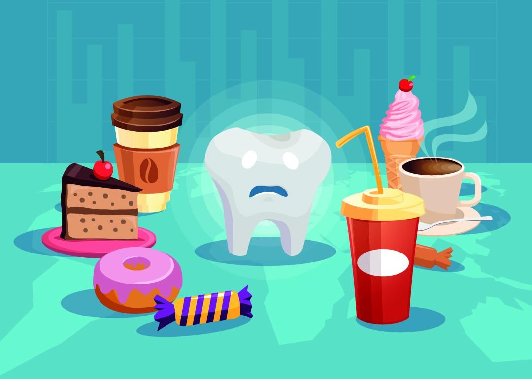 Vector illustration of a sad tooth surrounded with common sweet and sugar-based food.