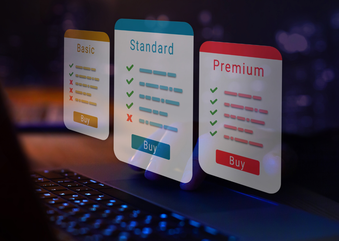 Three options, Basic, Standard, and Premium, float above a keyboard in a subscription plan options concept.