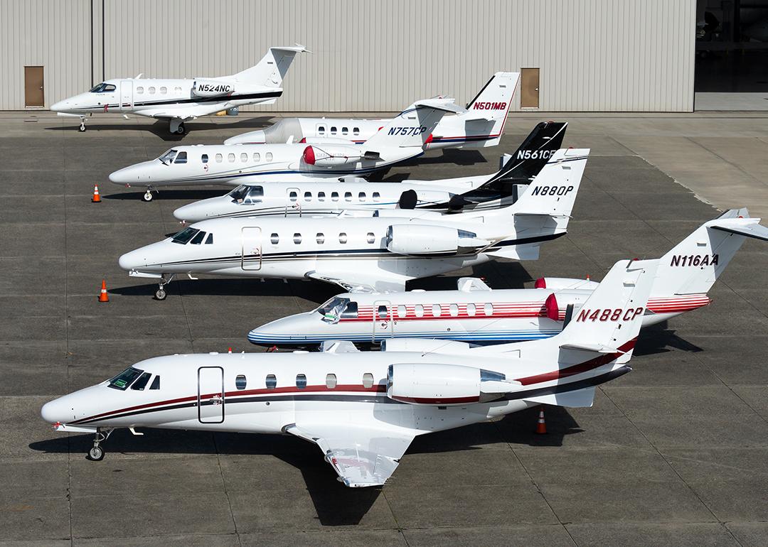A row of private business jets in an airport in King County, Seattle.