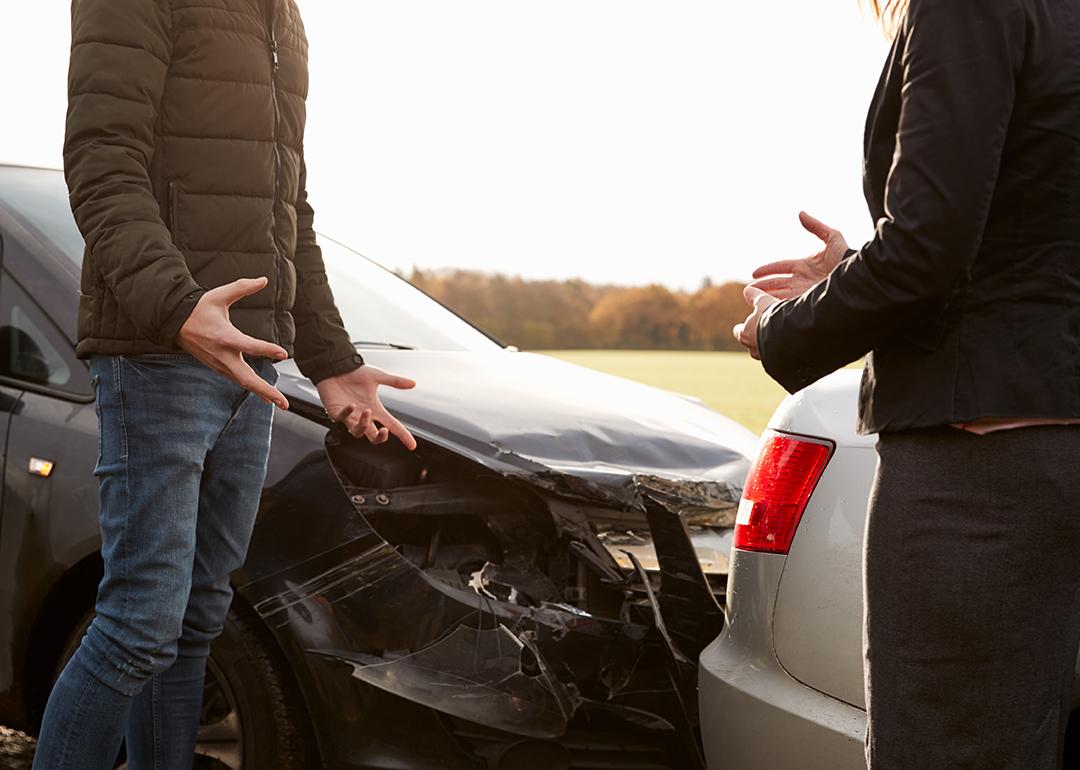 Two drivers arguing after a road accident.