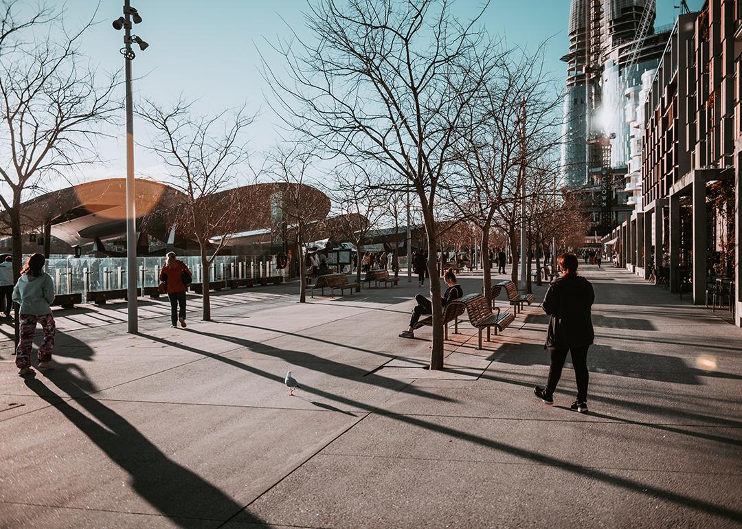 People along a walkway during wintertime.