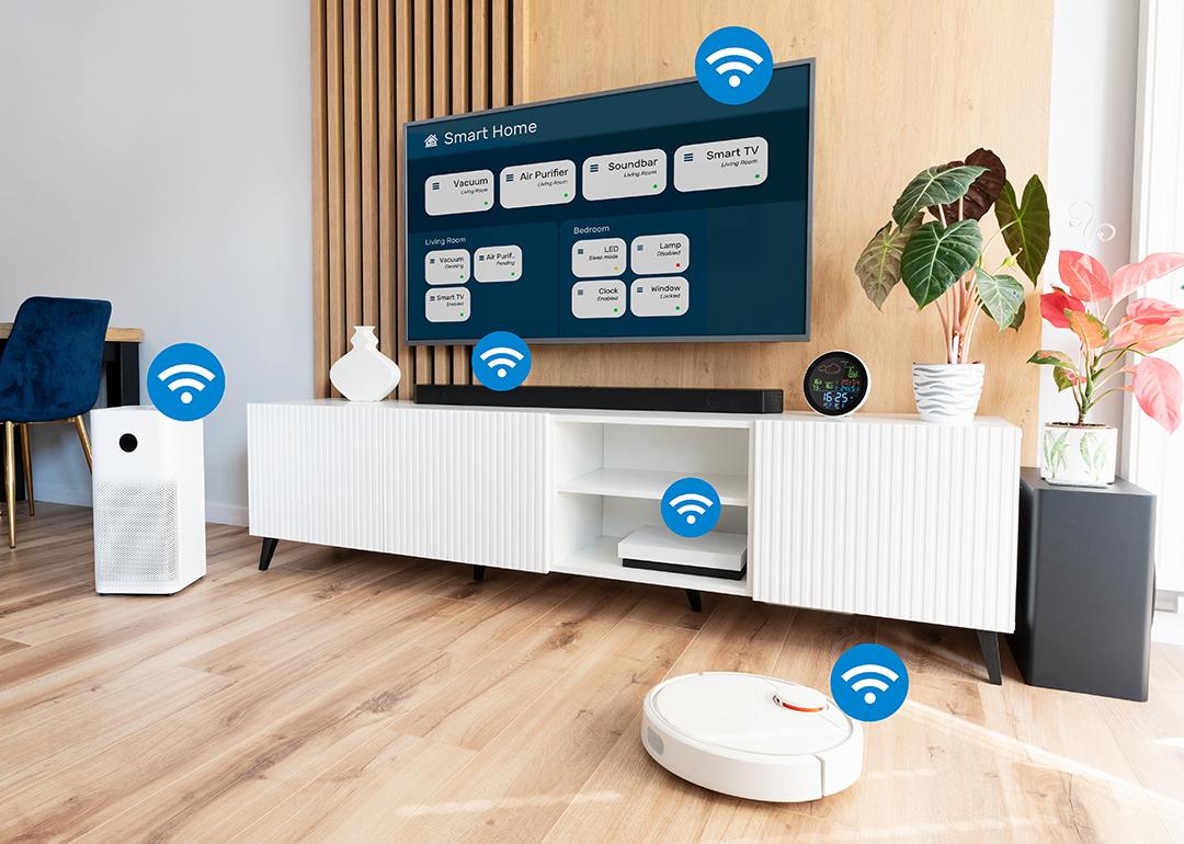 Smart devices in a living room labelled with wifi icons.
