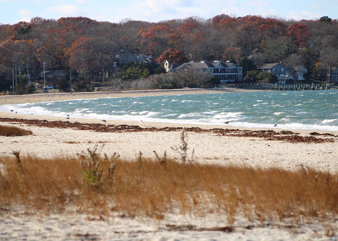 Luxury homes along the Noyac Bay beach in Sag Harbor, New York during winter.