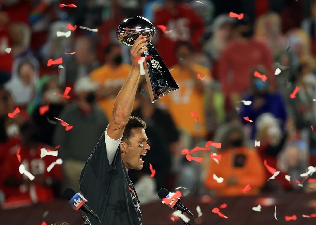 Tom Brady holding up a trophy after winning uper Bowl LV at Raymond James Stadium on February 07, 2021 in Tampa, Florida.