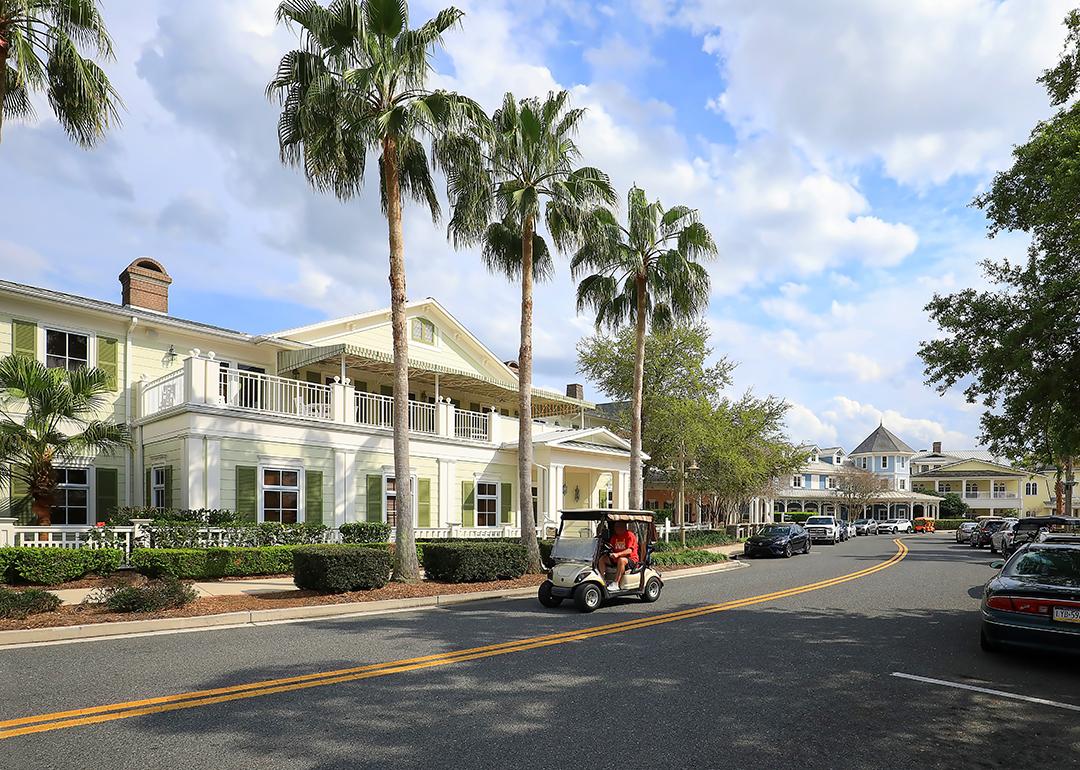 View of a road in The Villages, a popular retirement golf cart-loving community in Florida.