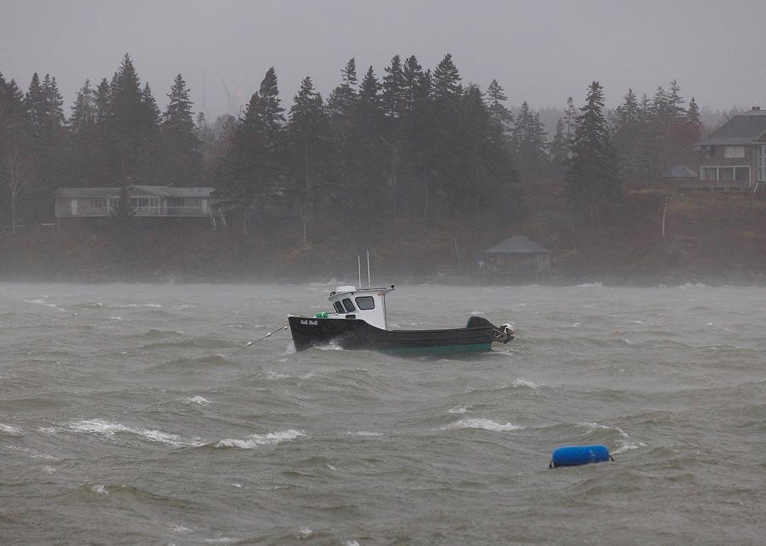 A lobster boat at sea during a storm in the North Haven Harbor, Maine.