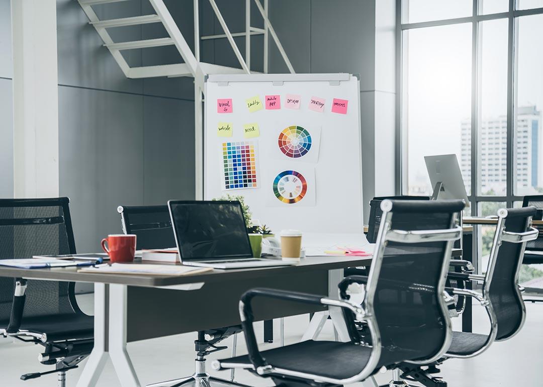 A modern office space with a creativity board.