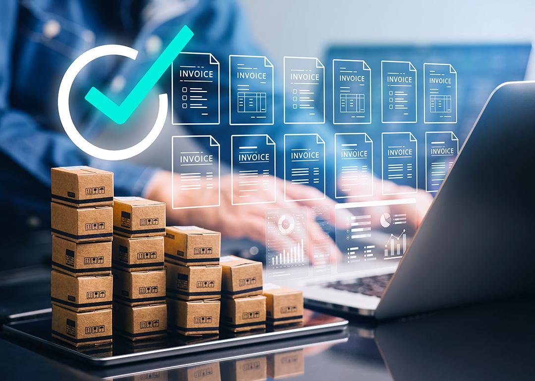 Businessperson using a laptop with small boxes of inventory on the side, illustrated with electric invoice software graphics.